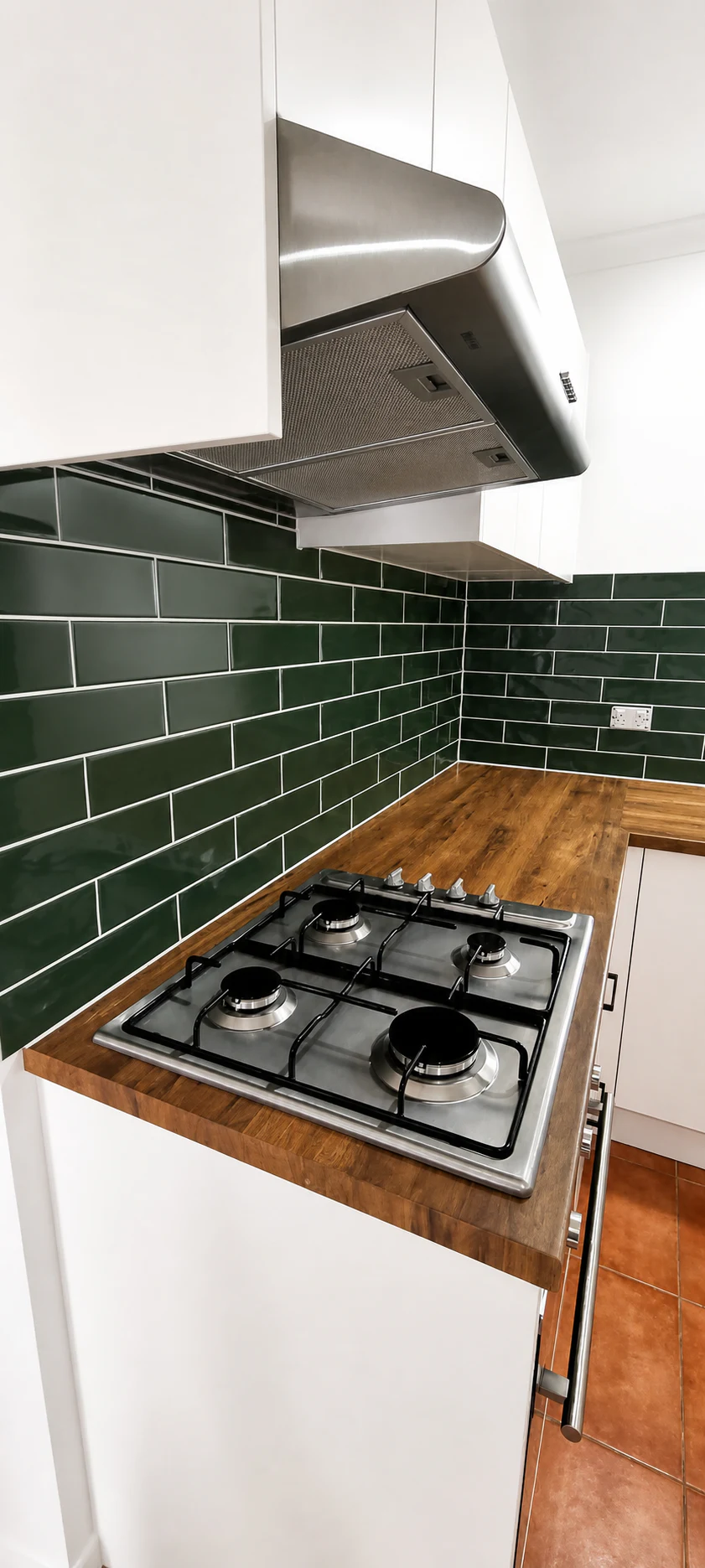 Deep green kitchen — finished subway splashback
